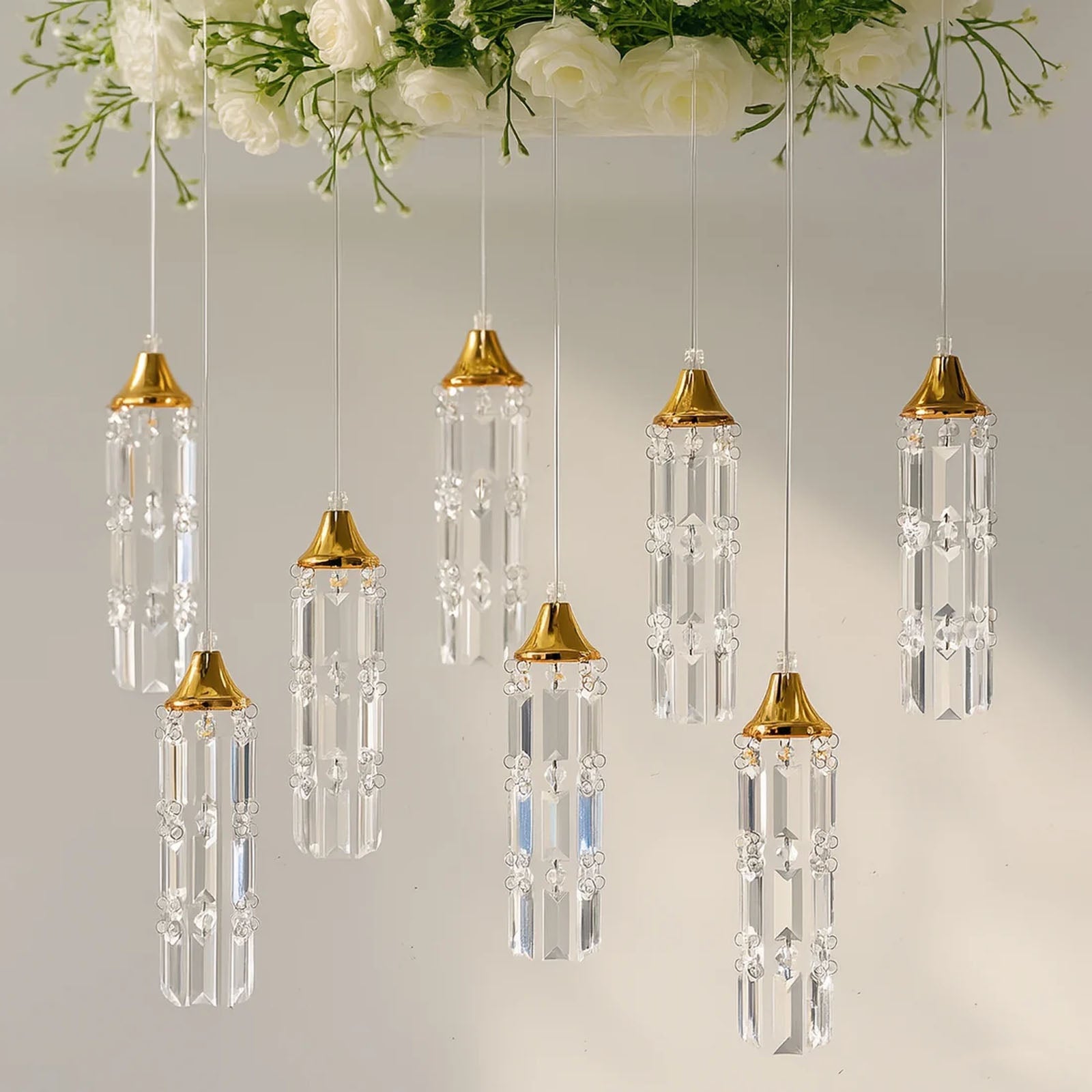 Gold bell frame with warm white crystal pendants hanging decor.