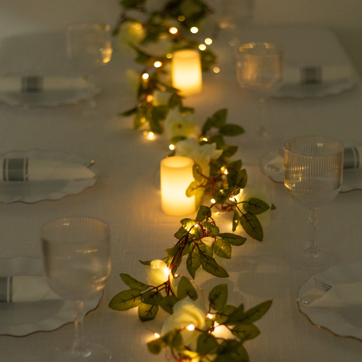 Warm white silk rose flower garland vine string lights with battery operation.