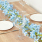 Blue jasmine silk flower garland with warm white LED lights.
