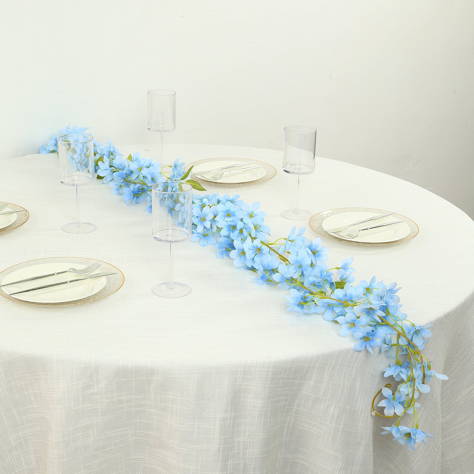 Blue jasmine silk flower garland with warm white LED lights, 6ft long.