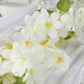 White jasmine silk flower garland with warm white fairy lights.