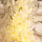 White jasmine silk flower garland with warm white LED lights.