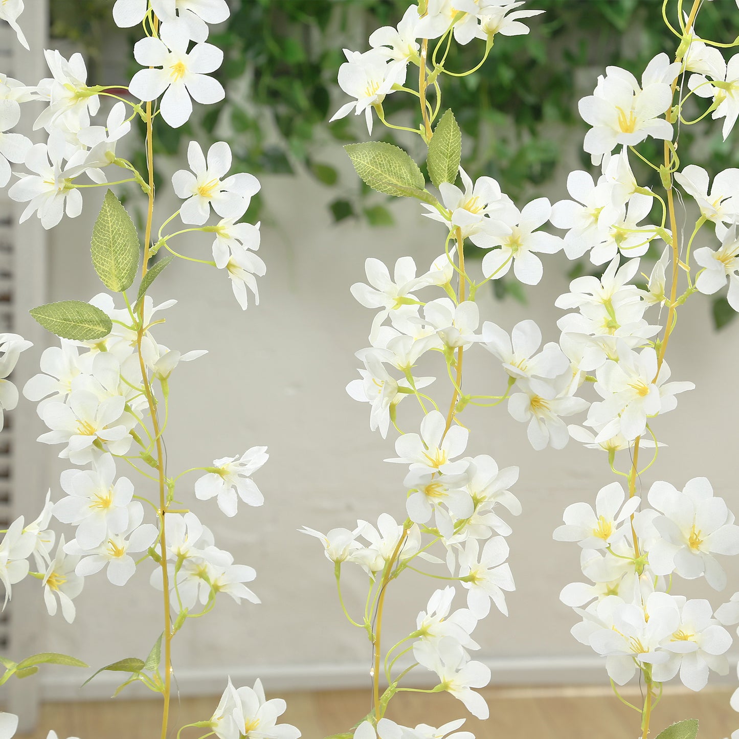 White jasmine flower garland with warm white LED lights, 6ft long.