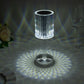 Color-changing LED crystal cylinder table lamp with a white glow.
