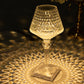 Color changing acrylic crystal table lamp with warm light effects.