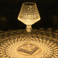 Color changing LED acrylic crystal lamp with touch control, emitting warm light.
