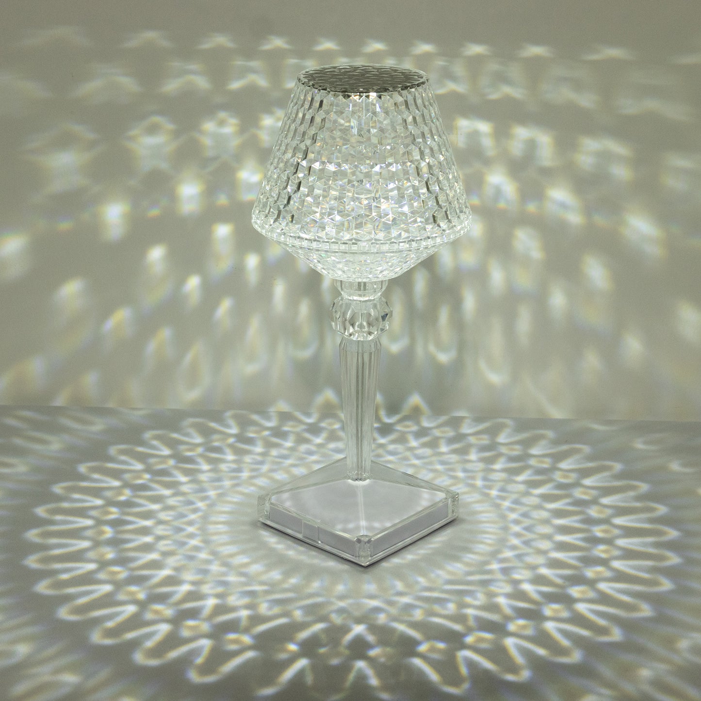 Color changing crystal cup shape table lamp with LED light.