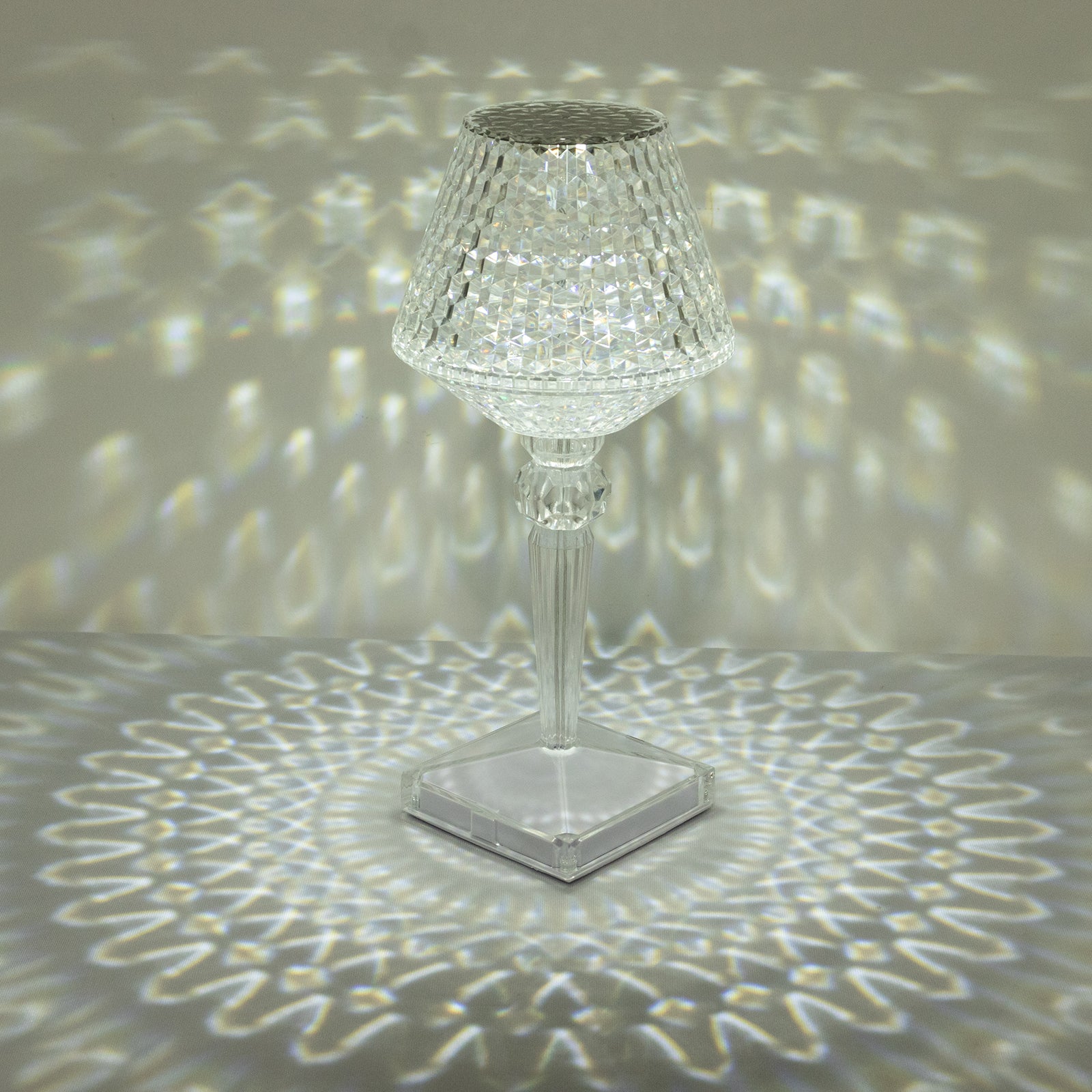 Color changing crystal cup shape table lamp with LED light.