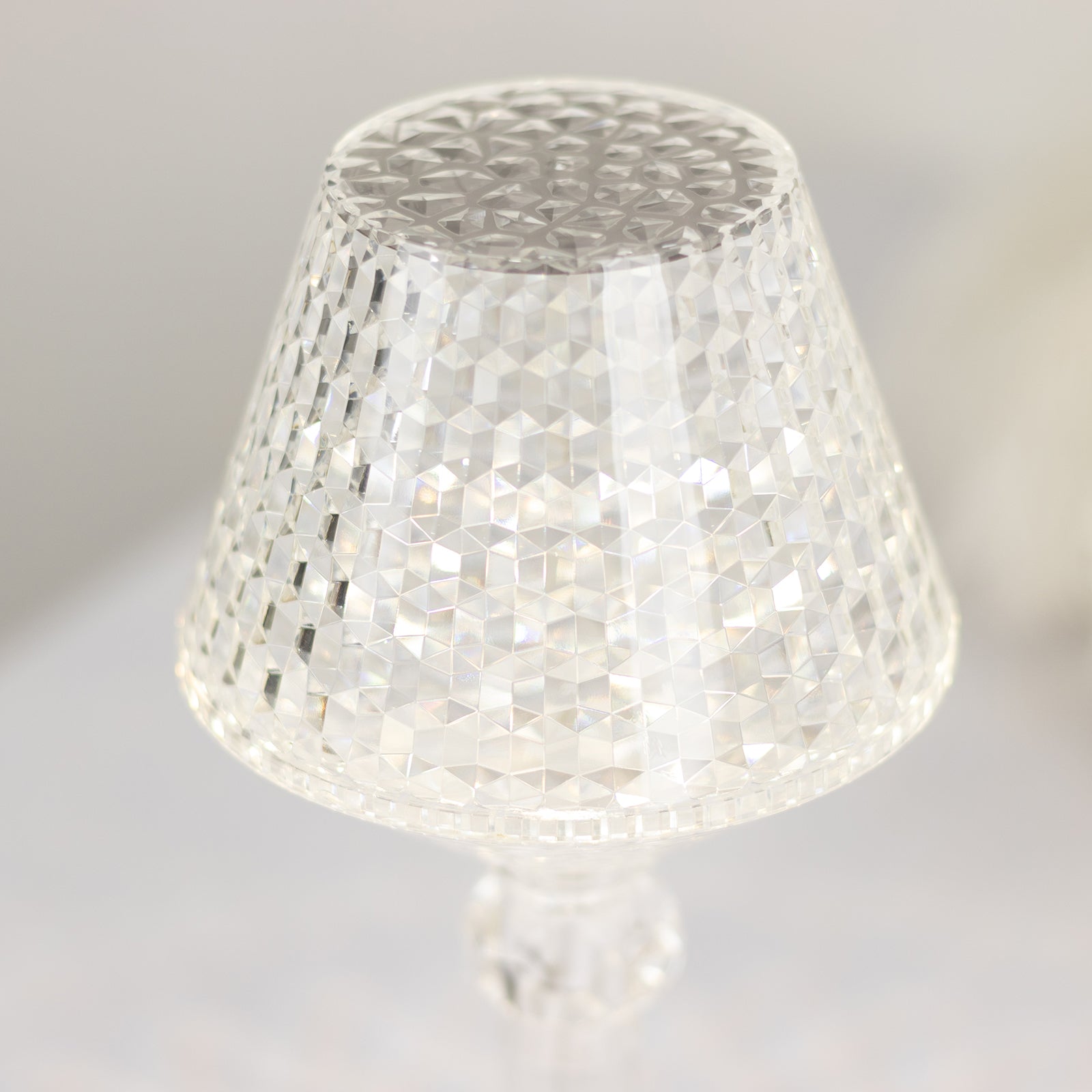 Colorless LED acrylic crystal cup shape lamp, touch control, cordless design.