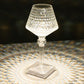 Color changing acrylic crystal table lamp with a sparkling design.