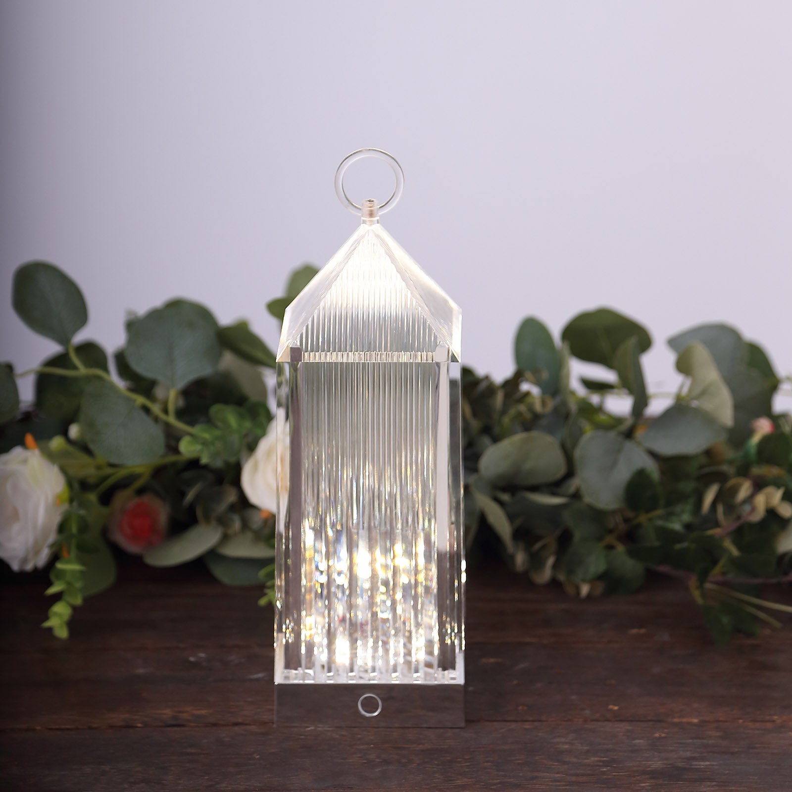 Clear LED crystal lantern table lamp with touch control and rechargeable feature.