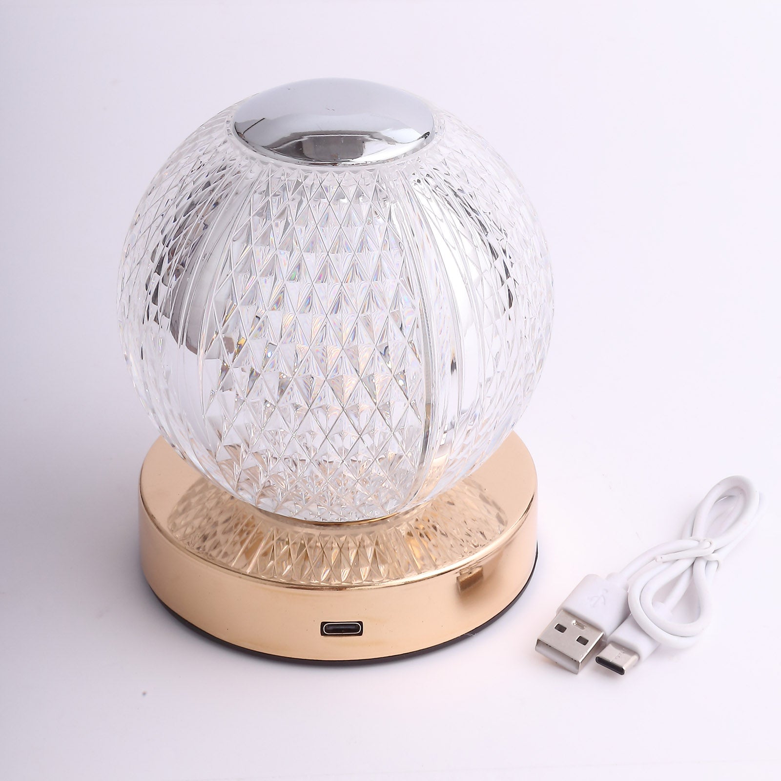 Dimmable LED crystal ball lamp with gold base, touch control, and rechargeable design.