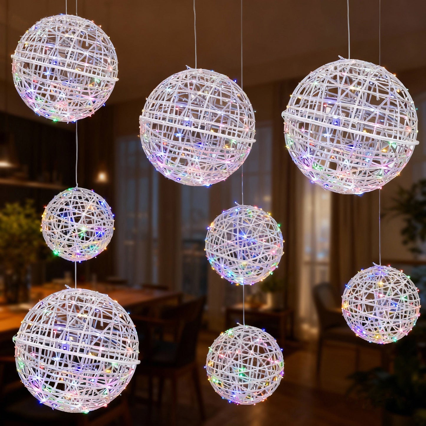 White woven rattan orbs with multicolor LEDs, hanging decor.