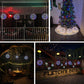 White woven rattan orbs with multicolor LEDs and festive lighting.