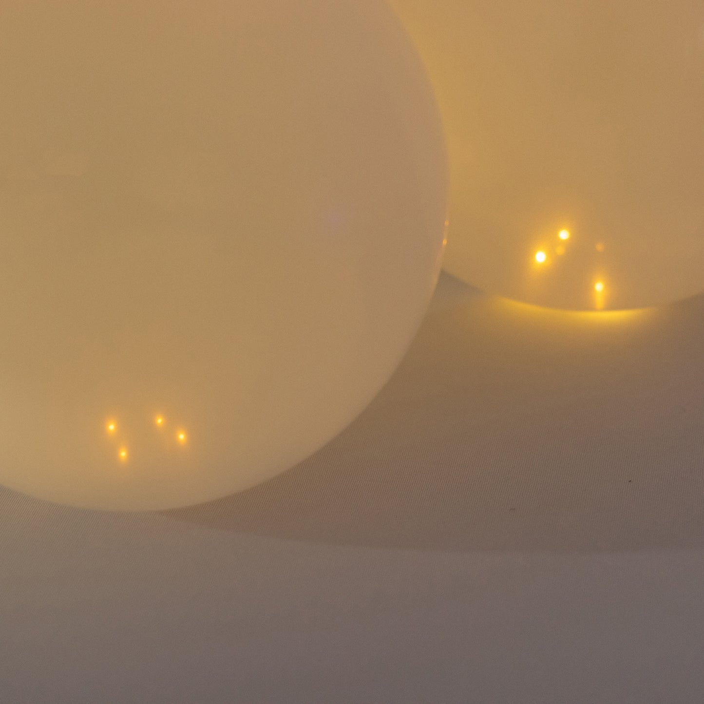 Warm white mini LED balloon lights, waterproof and battery-operated.