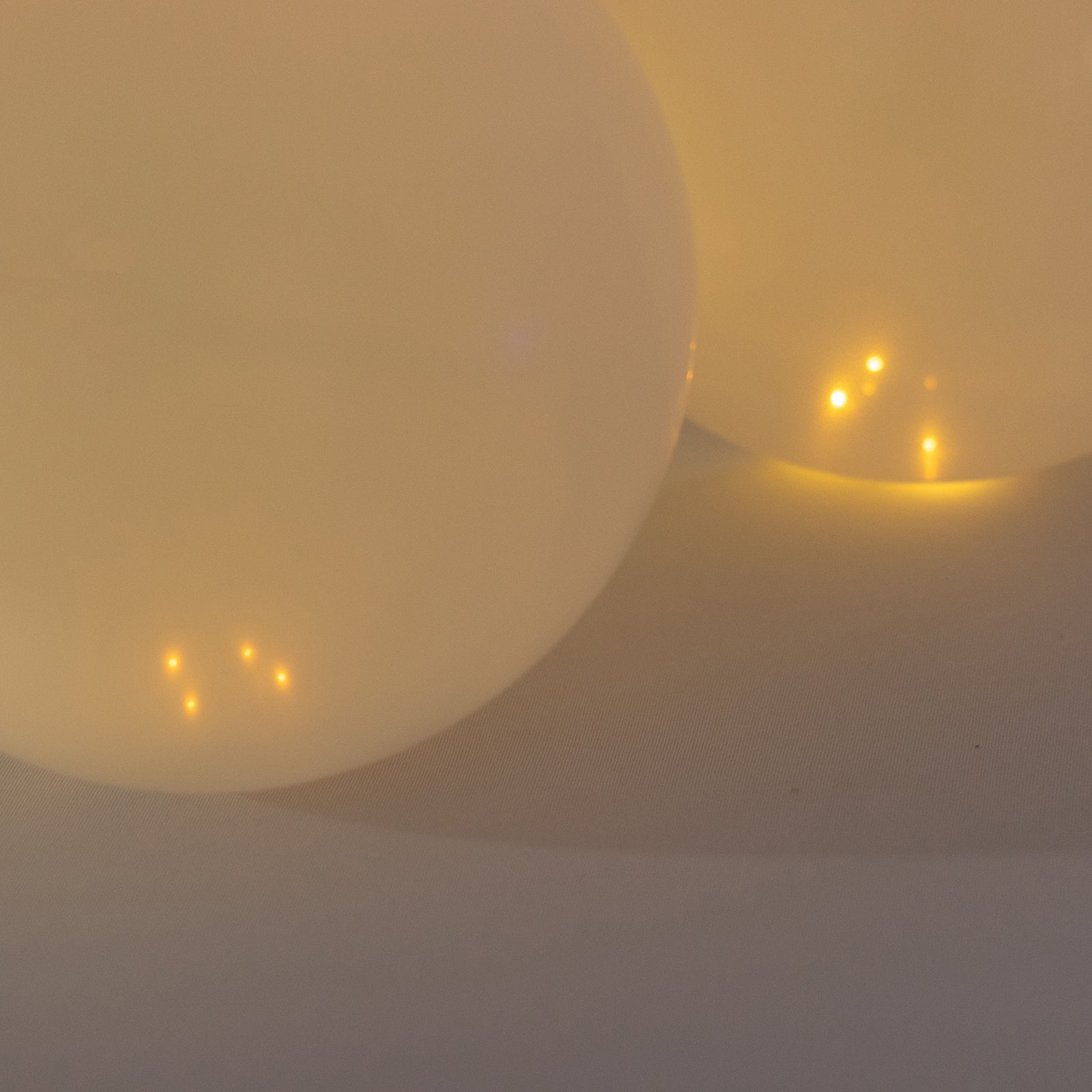 Warm white mini LED balloon lights, waterproof and battery-operated.