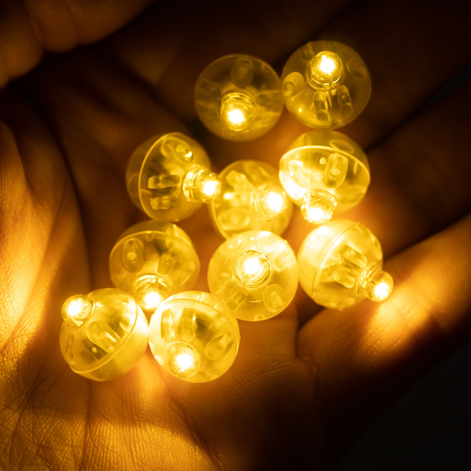 Warm white mini LED balloon lights, waterproof, battery-operated, 0.5" size.