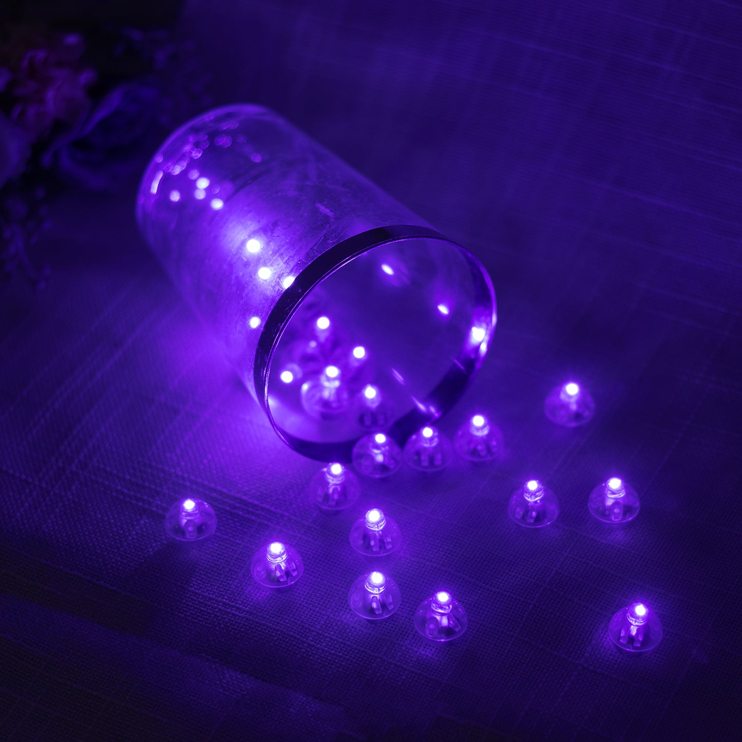 Purple mini LED balls, waterproof battery-operated lights in a 50 pack.