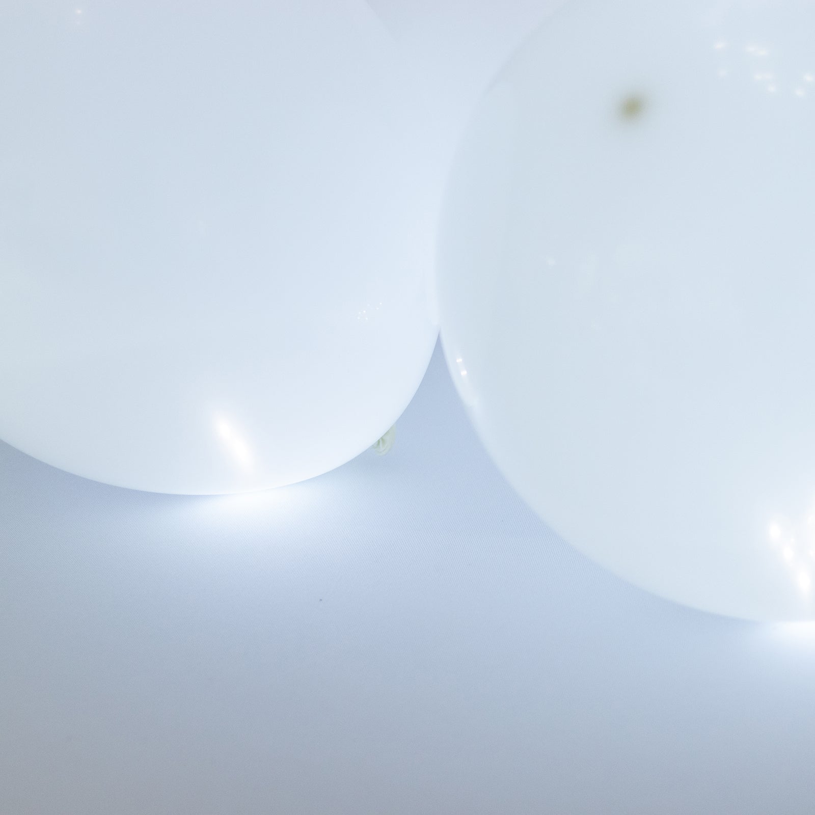 White round mini LED balls, waterproof balloon lights, 0.5" size.
