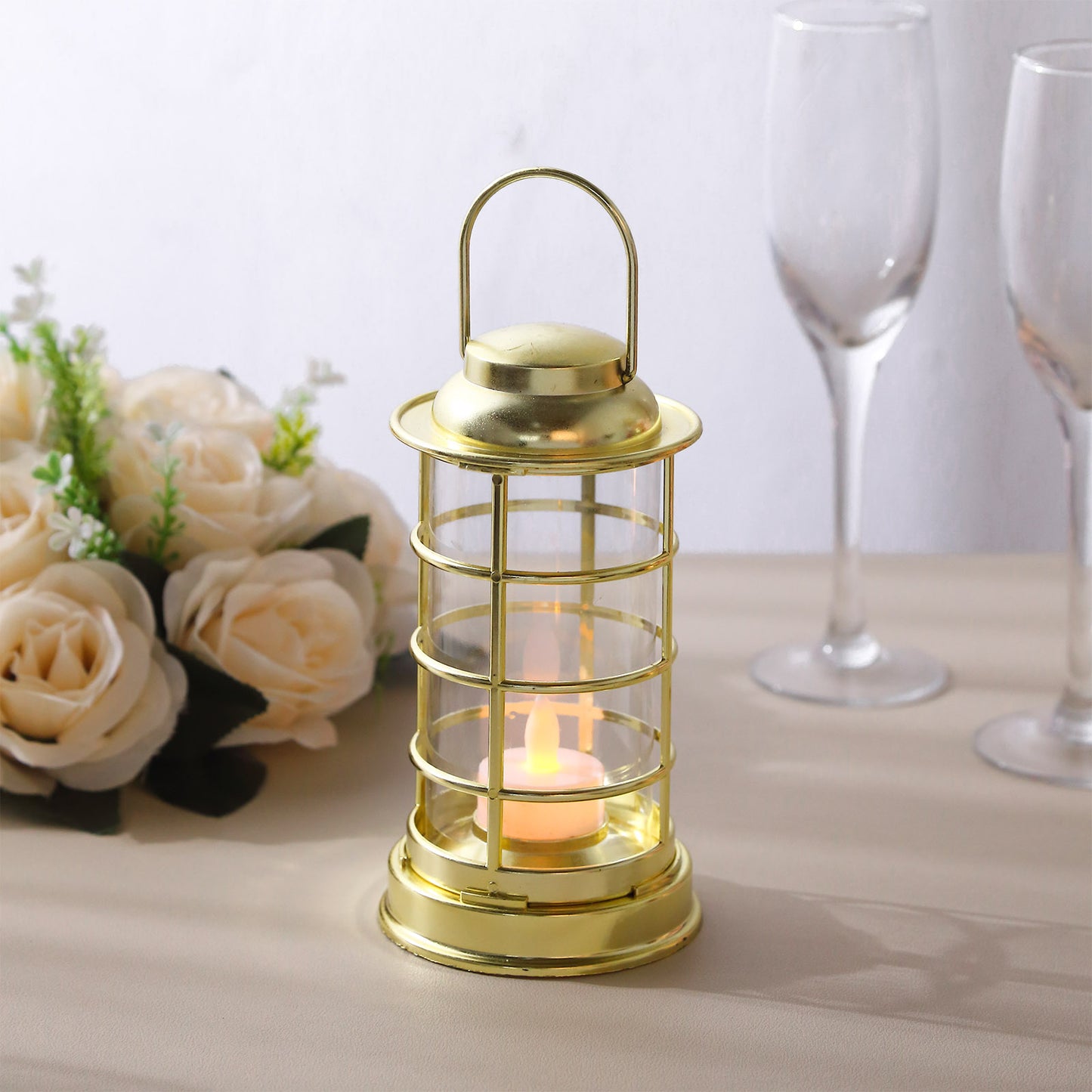 Gold LED mini lantern lamp with decorative tealight candle.