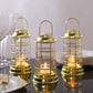 Gold LED mini lantern lamps for decorative tealight candles.