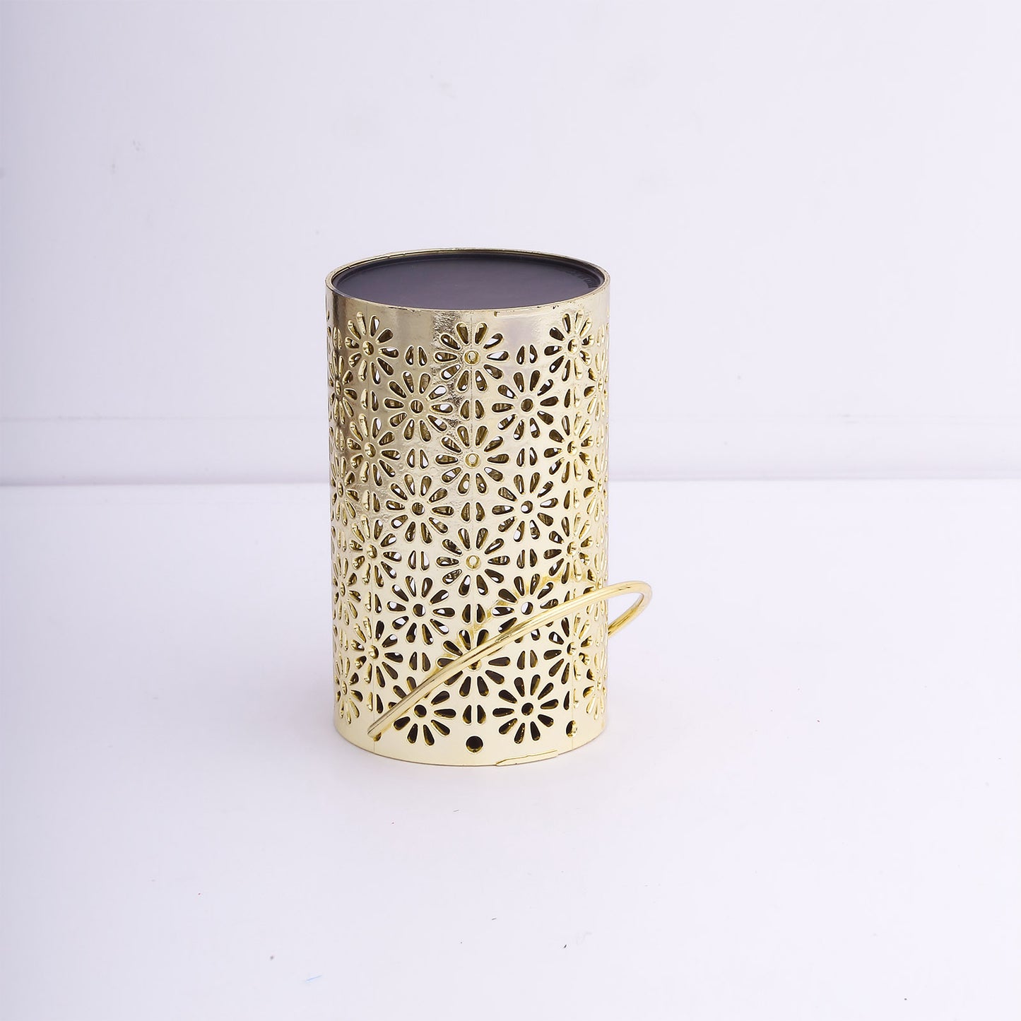 Gold decorative lantern light with flower design, battery operated for hanging.