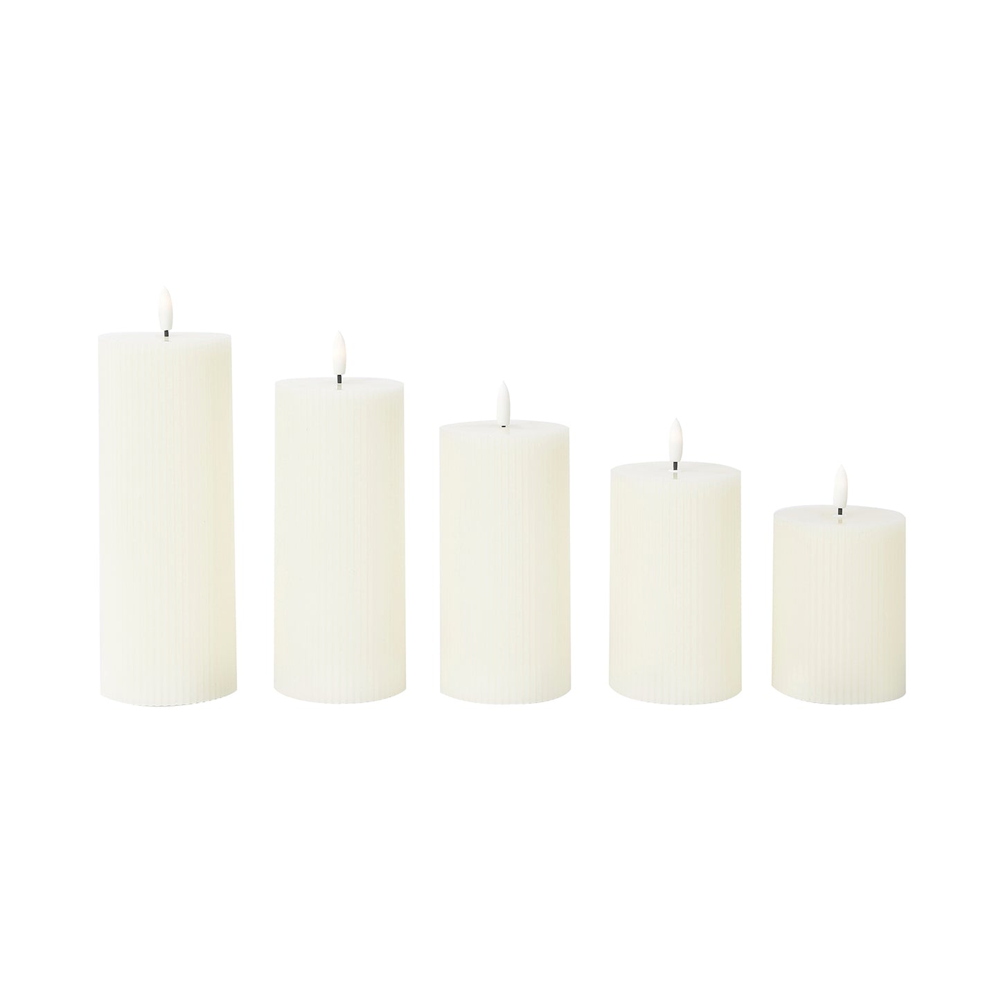 Ivory LED flameless pillar candles in ribbed design, set of 5.
