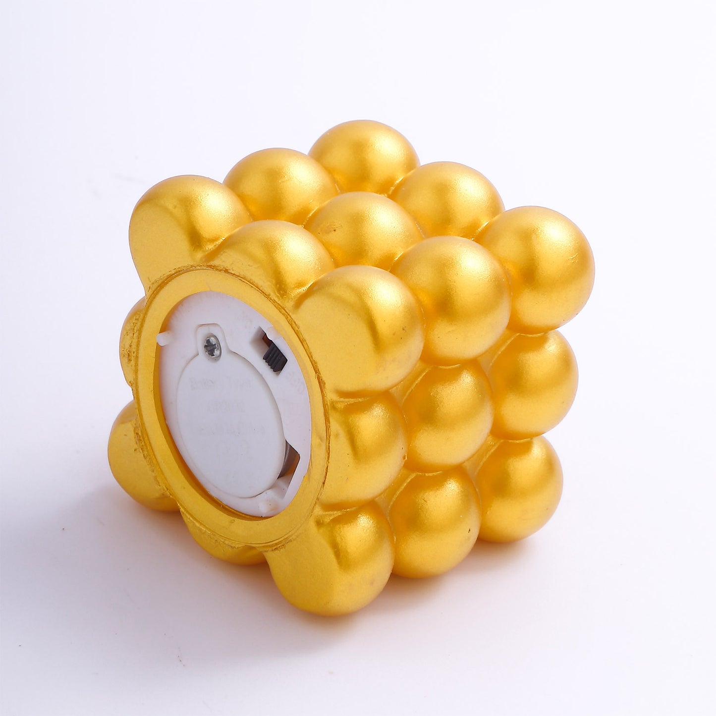 Metallic gold LED mini bubble candle, flameless and battery operated.