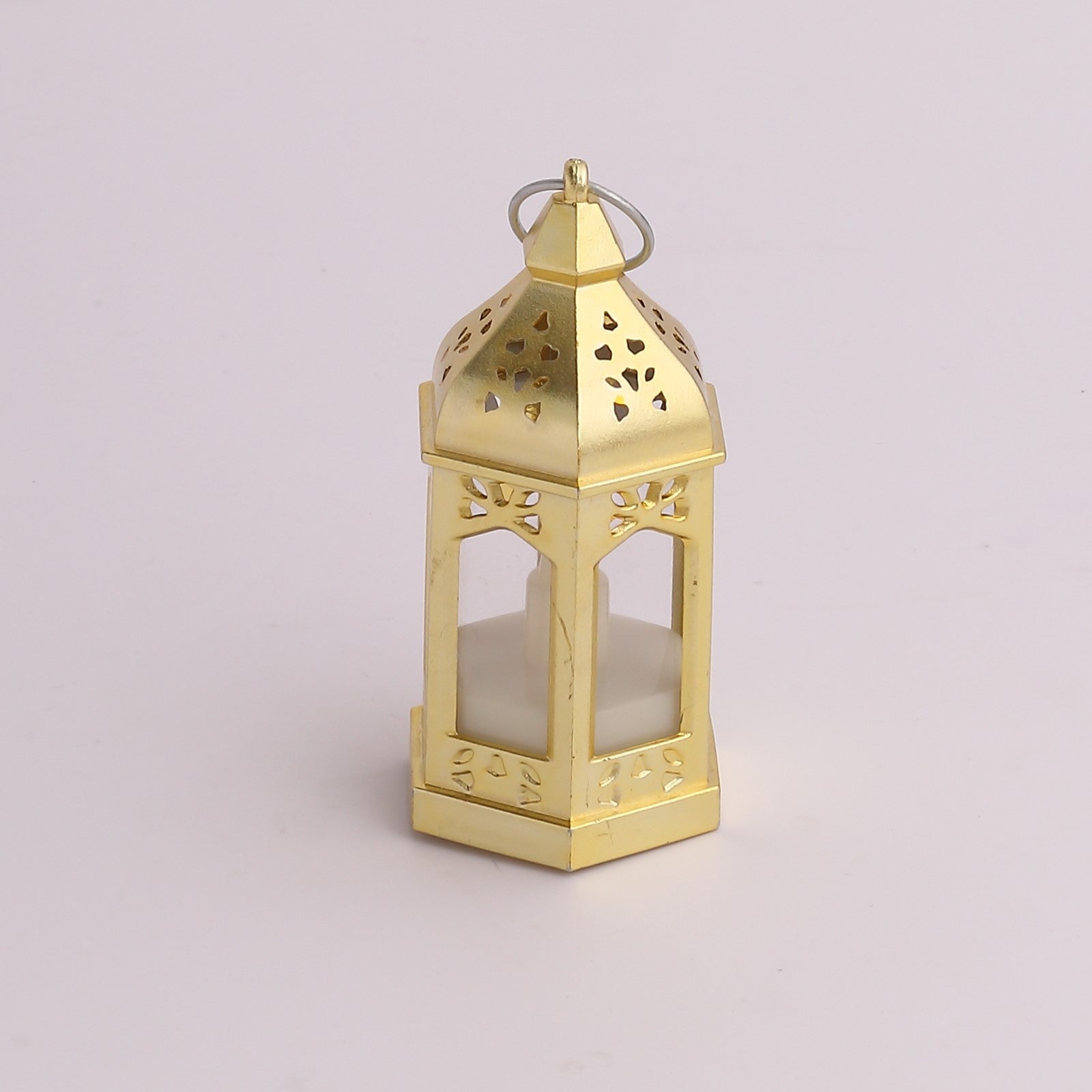 Gold vintage mini LED lantern, warm white flickering candlelight, Moroccan style.