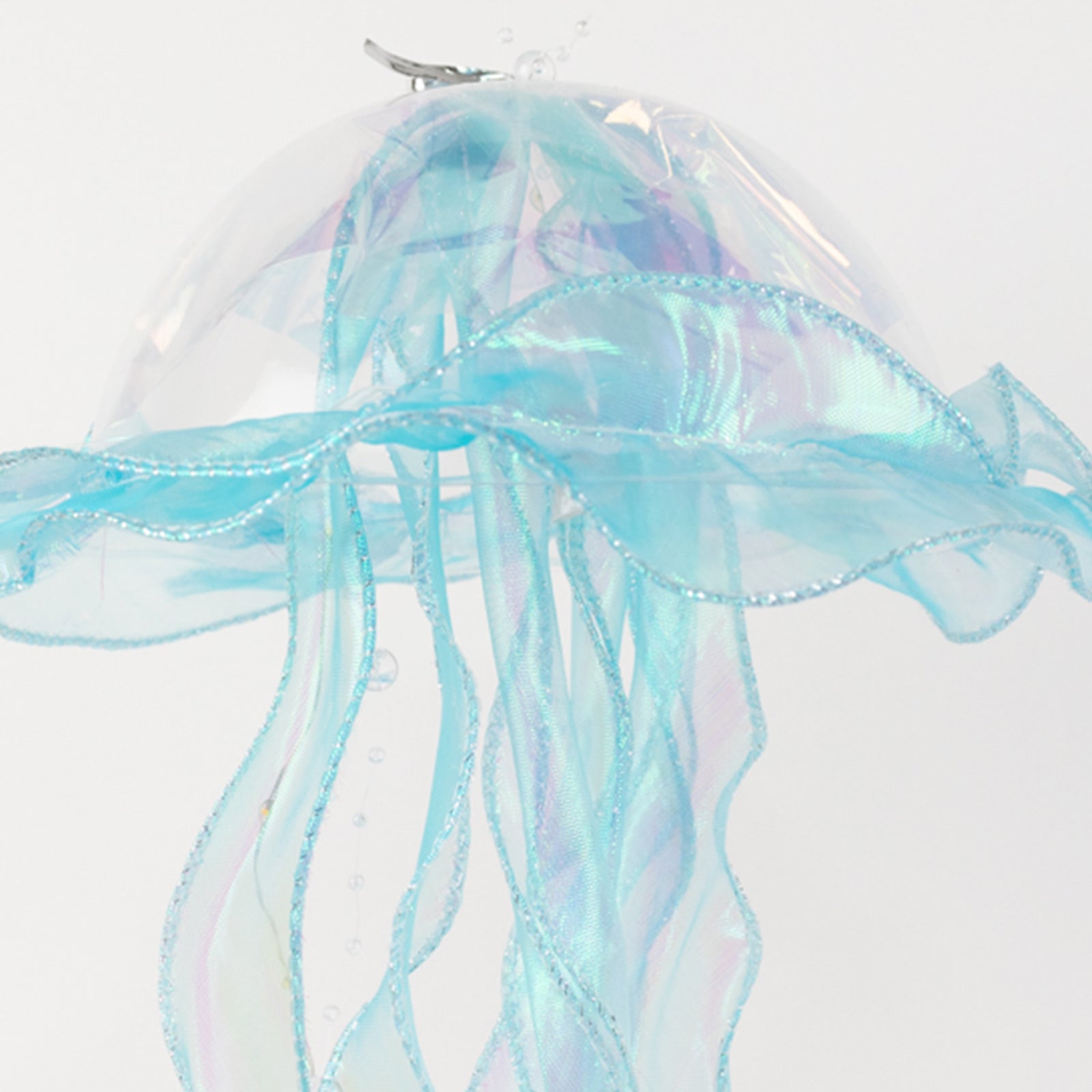 Blue jellyfish lantern light with organza ribbons, ideal for mermaid theme decor.