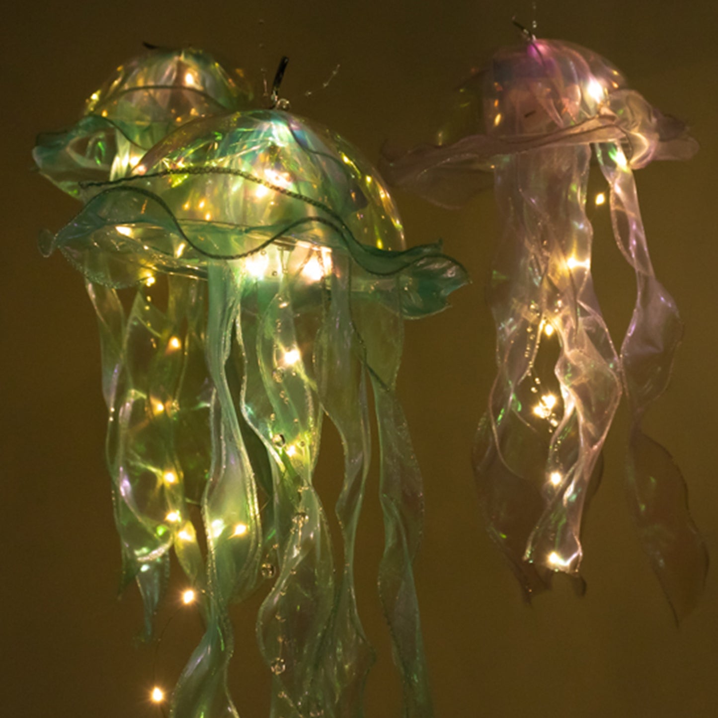 Blue and purple jellyfish lantern lights with LED accents.