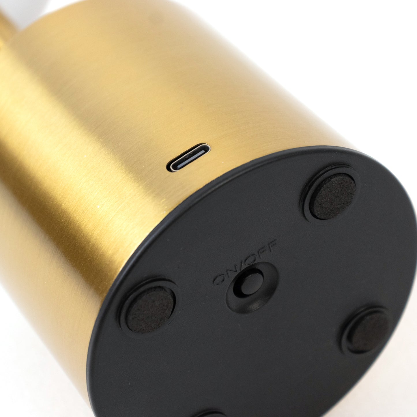 Gold metal LED table lamp with touch control and rechargeable design.