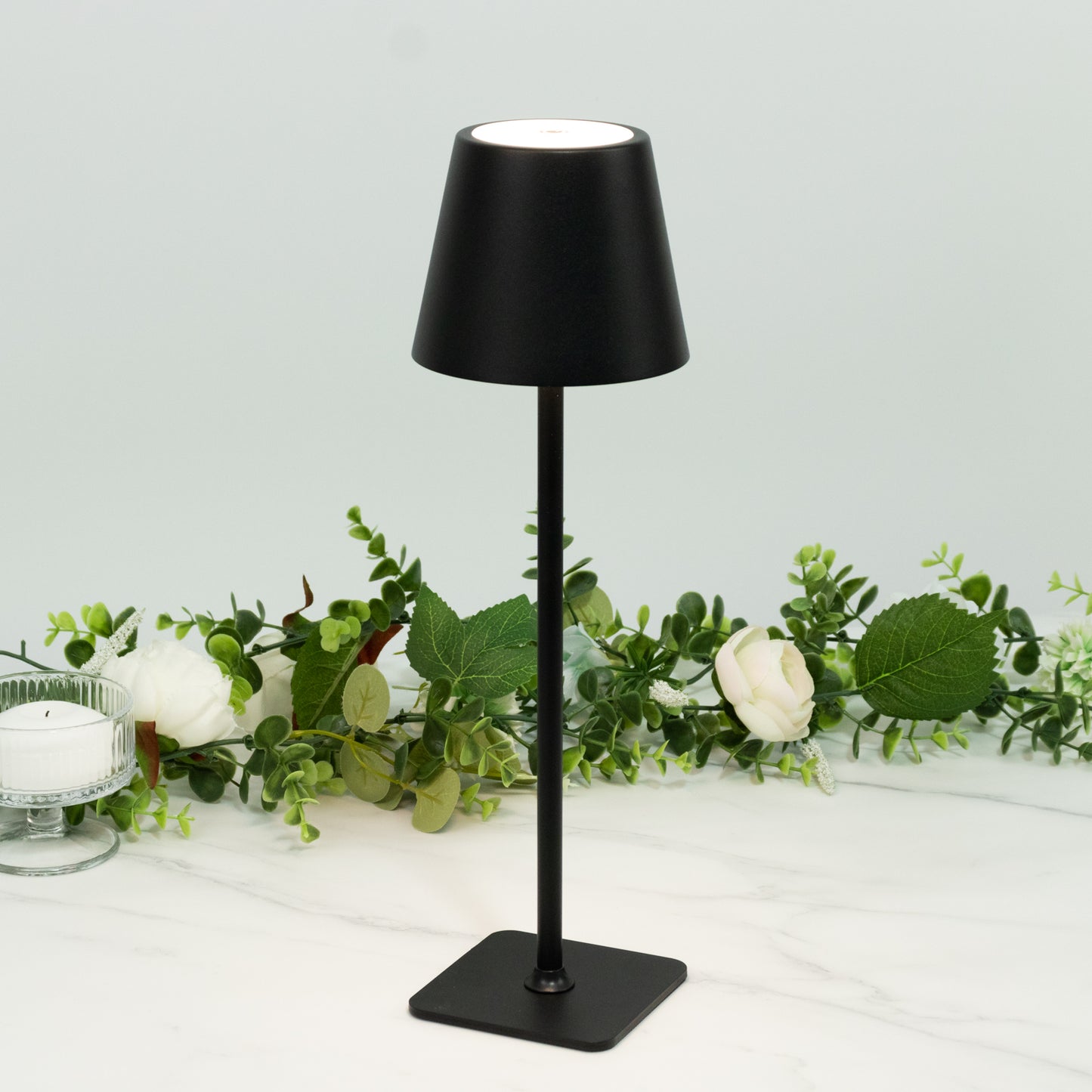 Black metal LED table lamp with classic empire lampshade.