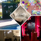 Neon pink "Let's Party" sign with LED lights and hanging chain wall décor.