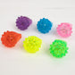 Colorful LED light-up rings in assorted colors for parties and events.