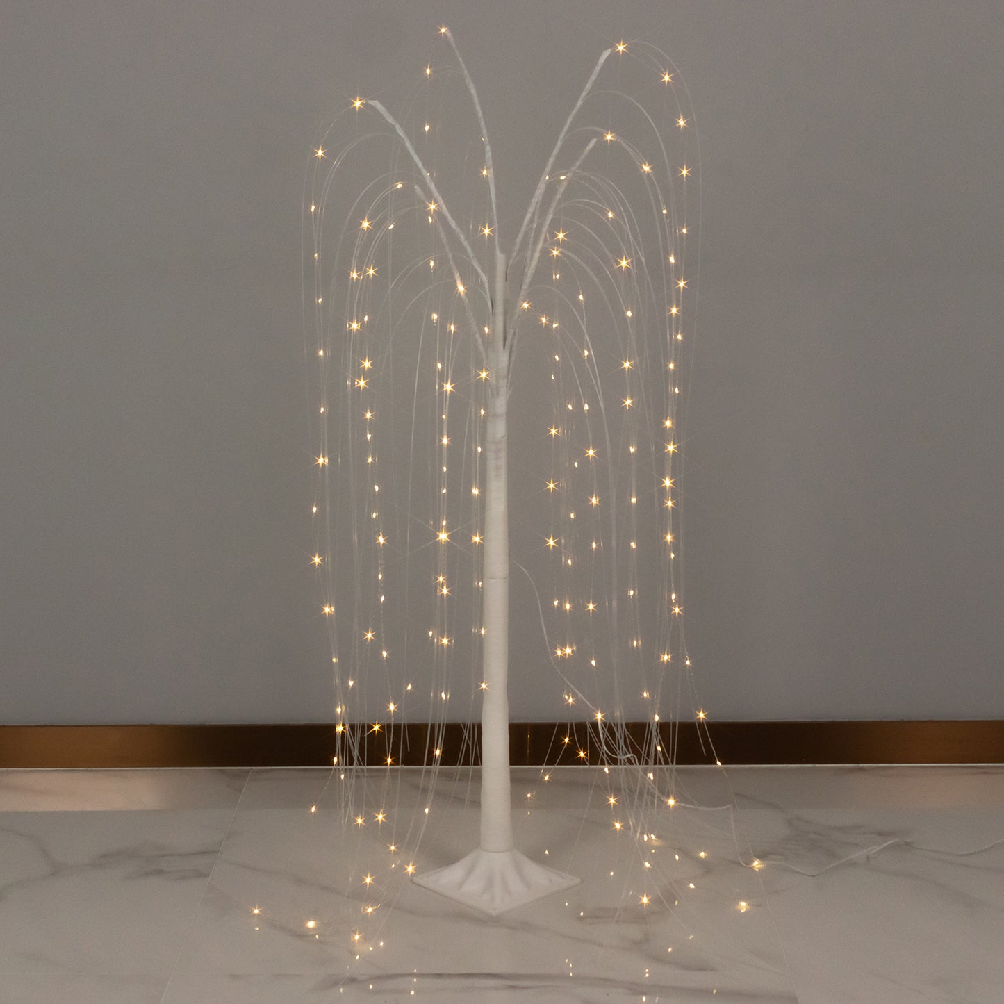 White LED weeping willow tree with warm white lights, 4ft tall.
