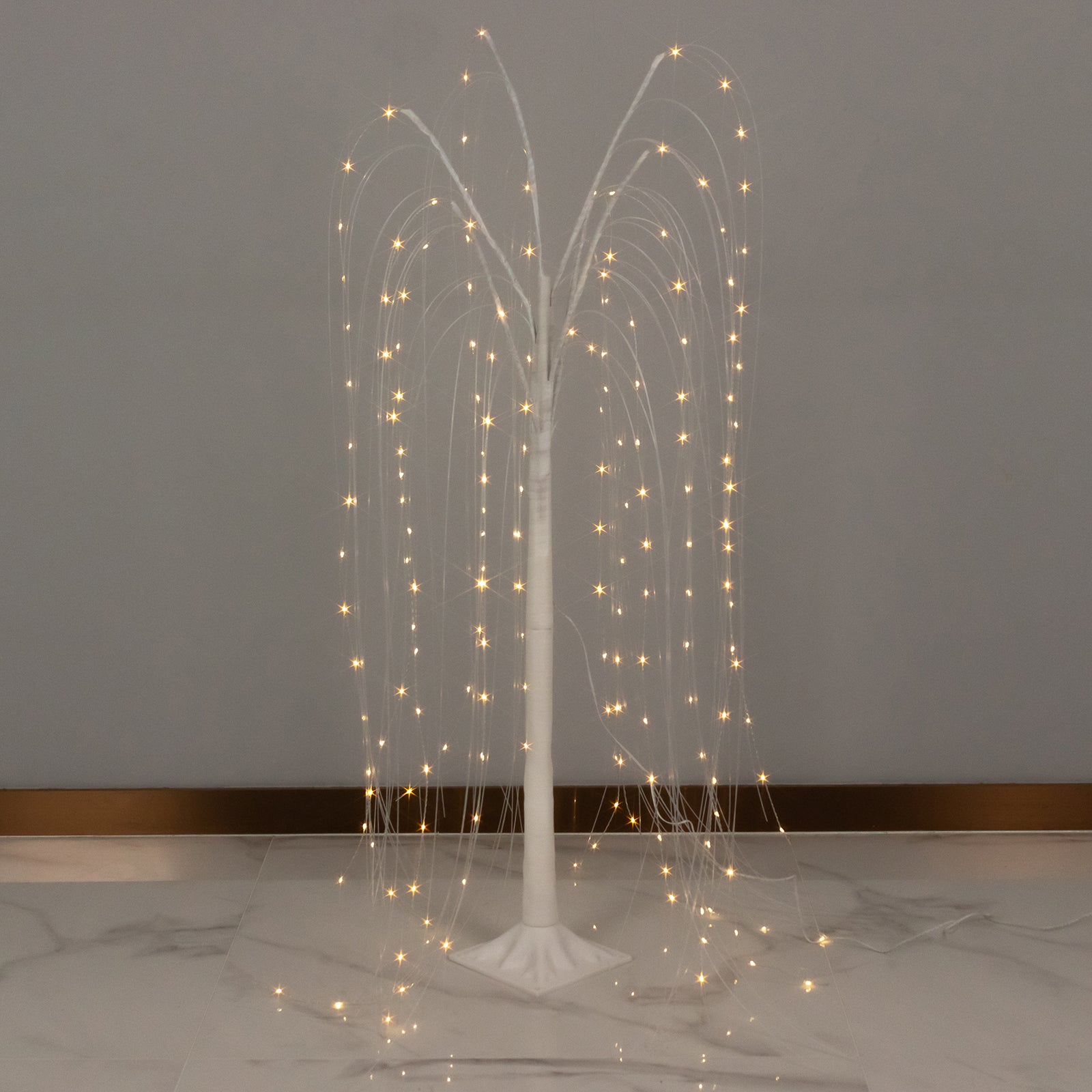 White LED weeping willow tree with warm white lights, 4ft tall.