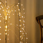 Warm white LED weeping willow tree centerpiece with fairy lights.