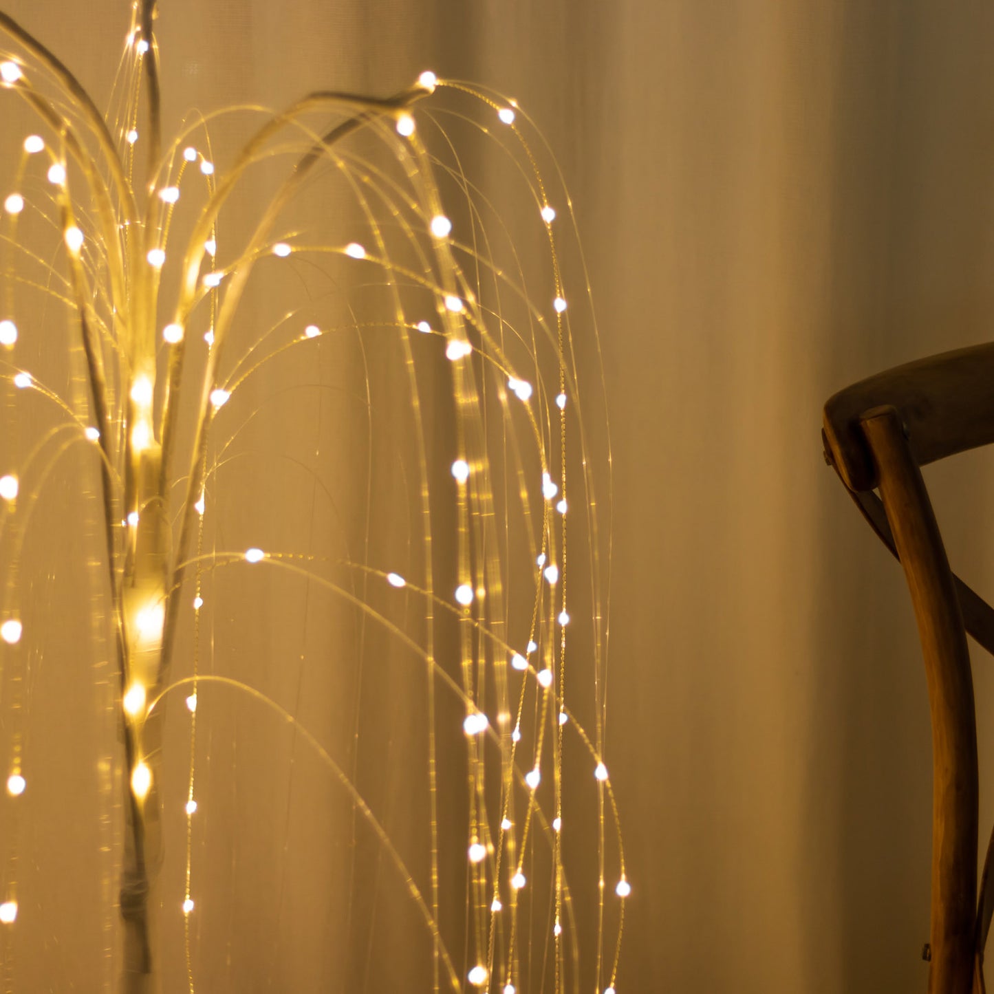 Warm white LED weeping willow tree centerpiece with fairy lights.