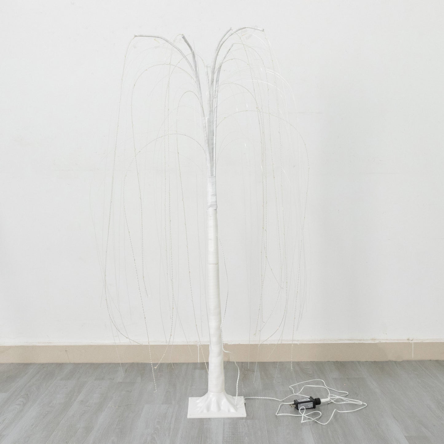 Warm white 180 LED artificial weeping willow tree with plug-in adapter.