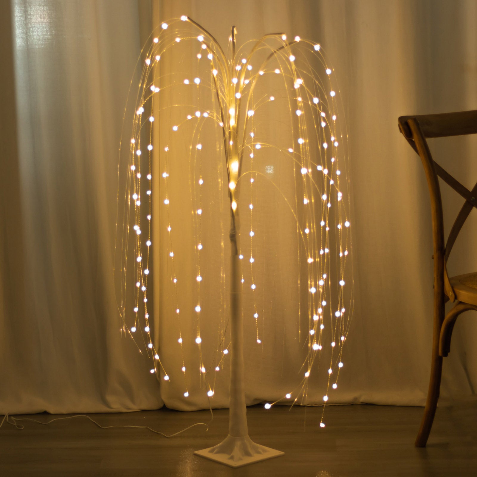Warm white LED artificial weeping willow tree centerpiece with fairy lights.