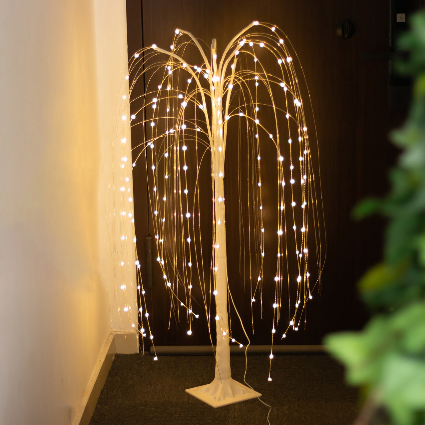 Warm white LED weeping willow tree centerpiece with fairy lights.