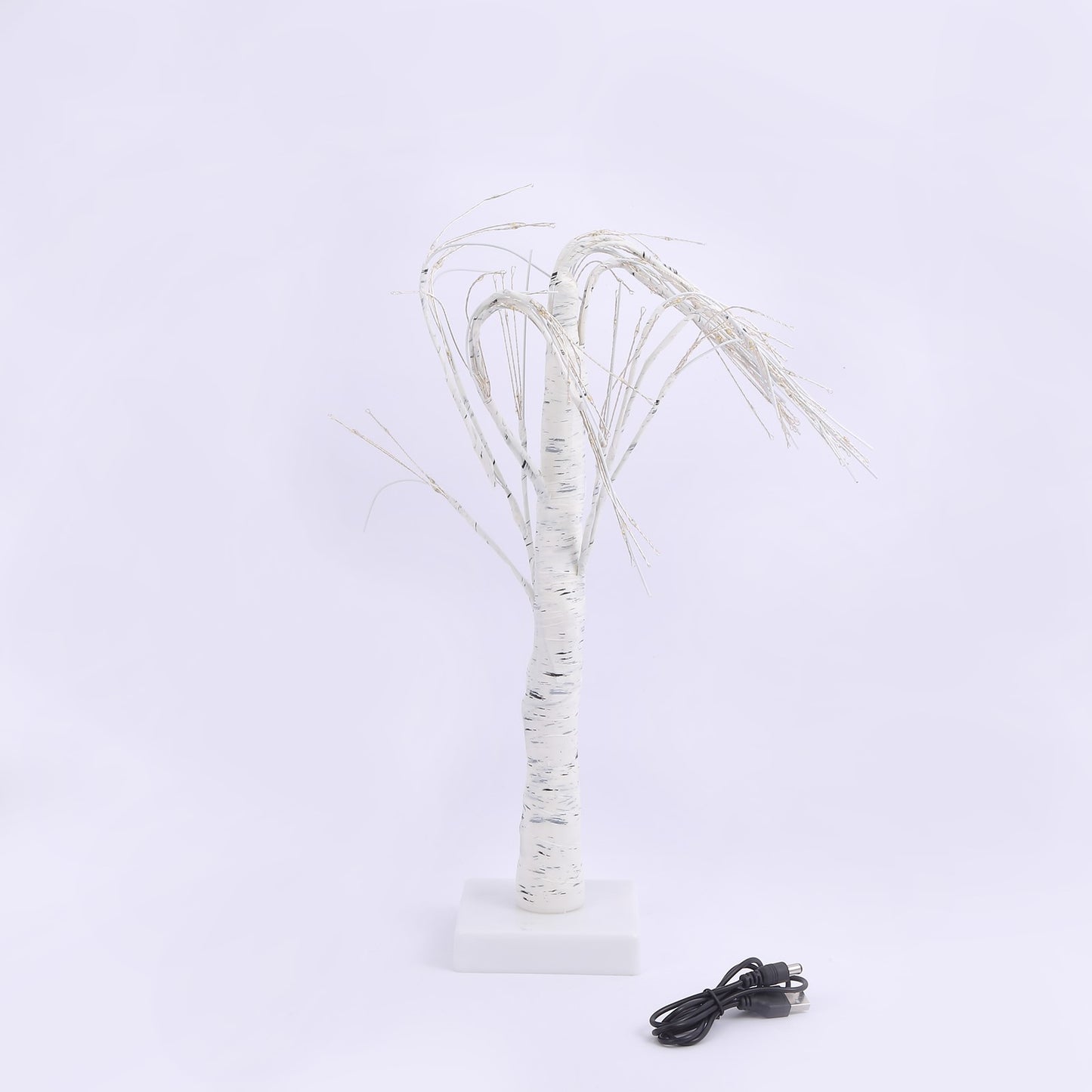 2ft white artificial LED birch tree lamp with warm white lights.