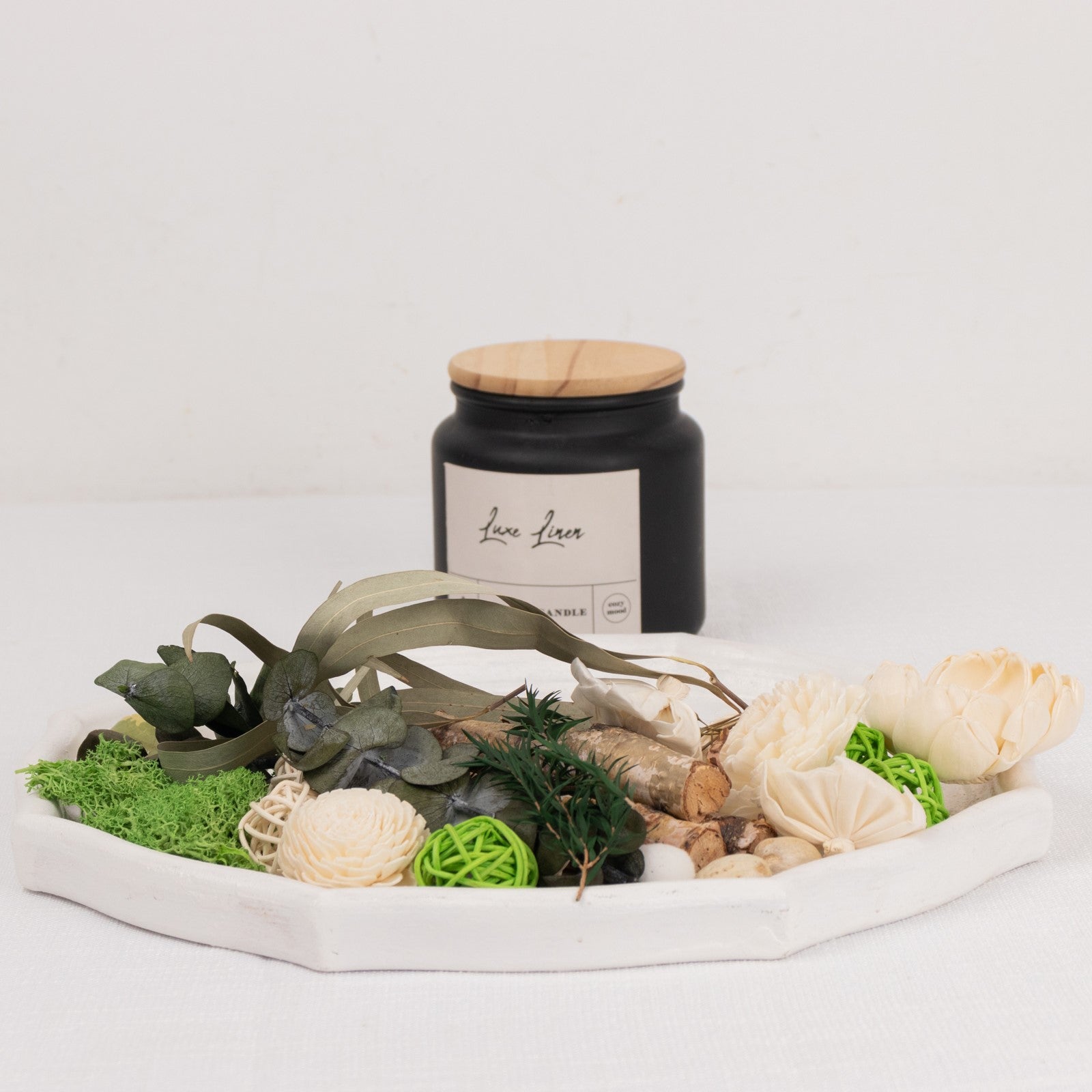 Natural dried assorted potpourri bowl with vanilla fragrance, featuring green elements.