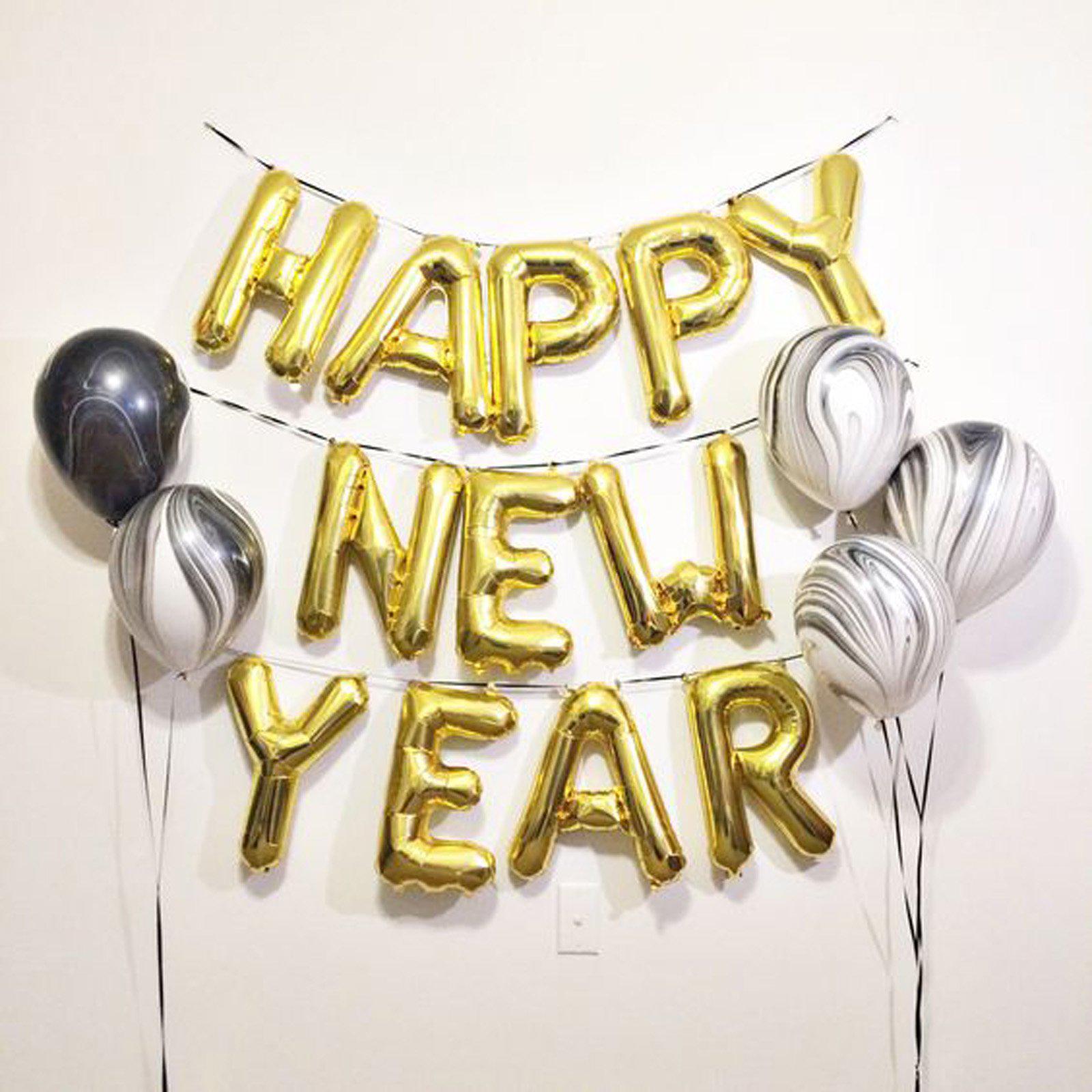 Matte gold letter and number balloons spelling "Happy New Year" on display.