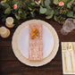 Blush sequin cloth napkin on an elegant dinner plate setting.