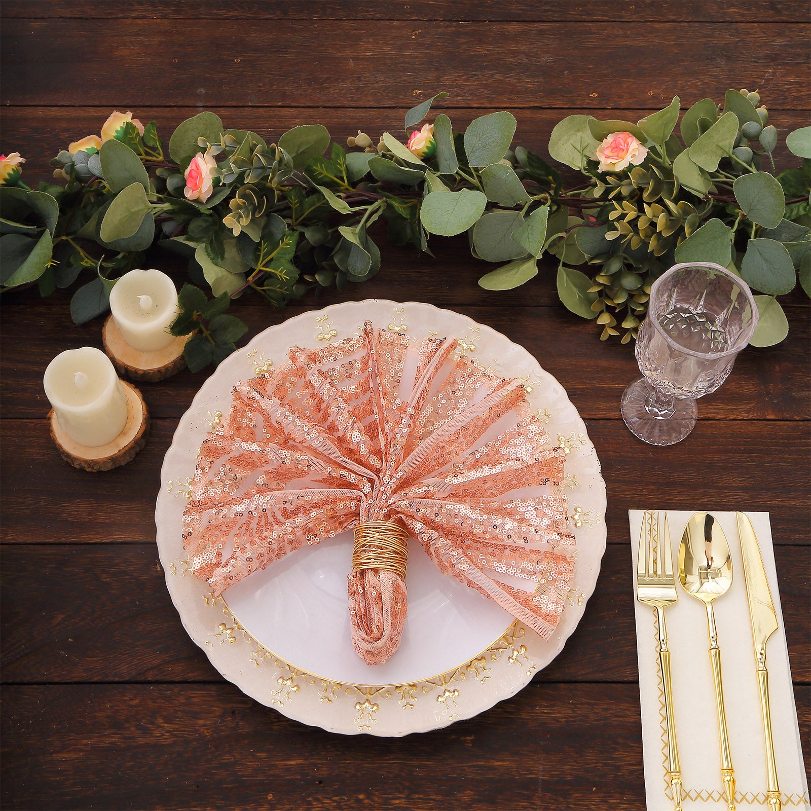 Blush geometric diamond glitz sequin cloth napkins on a decorative table setting.