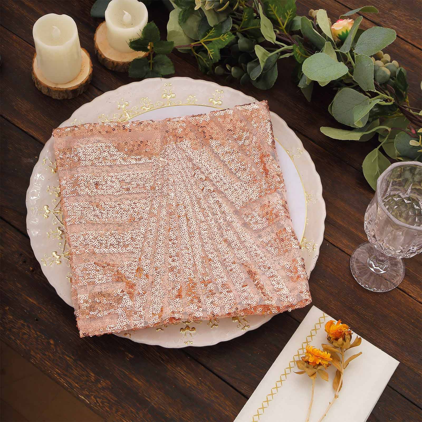Blush geometric diamond glitz sequin napkin on a decorative table setting.