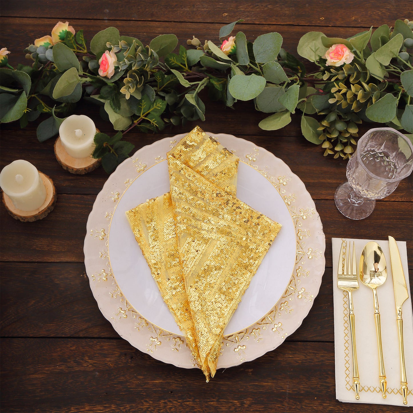 Gold geometric sequin napkins on an elegant table setting.