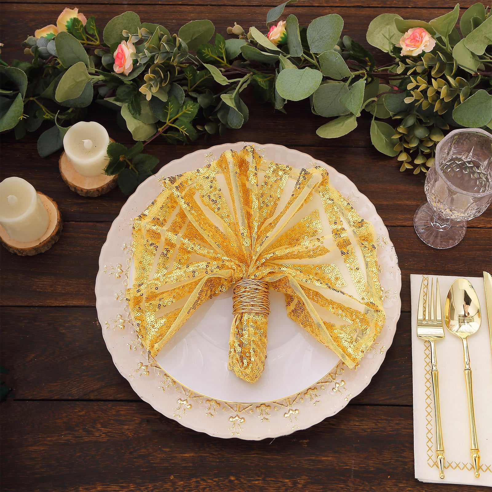 Gold geometric sequin napkins for elegant dining table decor.